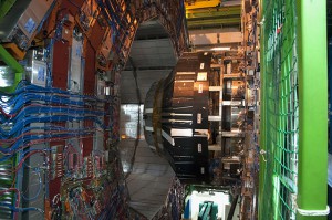 Stephanie Sunata/MEDILL Particle detectors such as the CMS at CERN search through the subatomic debris of near light-speed collisions to unravel secrets of the universe. The end-cap of the CMS detector is exposed here as the instrument gets upgrades. The CMS is one of two at CERN'S Large Hadron Collider that scientists used to find the elusive Higgs boson. 