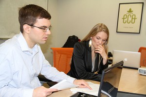 Alafair Biosciences Alafair researchers Scott Zawko and Sarah Mayes review current technology literature during a staff meeting. Mayes says Alafair is always interested in new technologies that may expand their product portfolio.