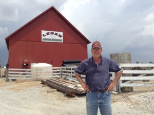 Abigail Thorpe/Medill Pig farmer Mark Legan outside his barn in Fillmore, Ind.